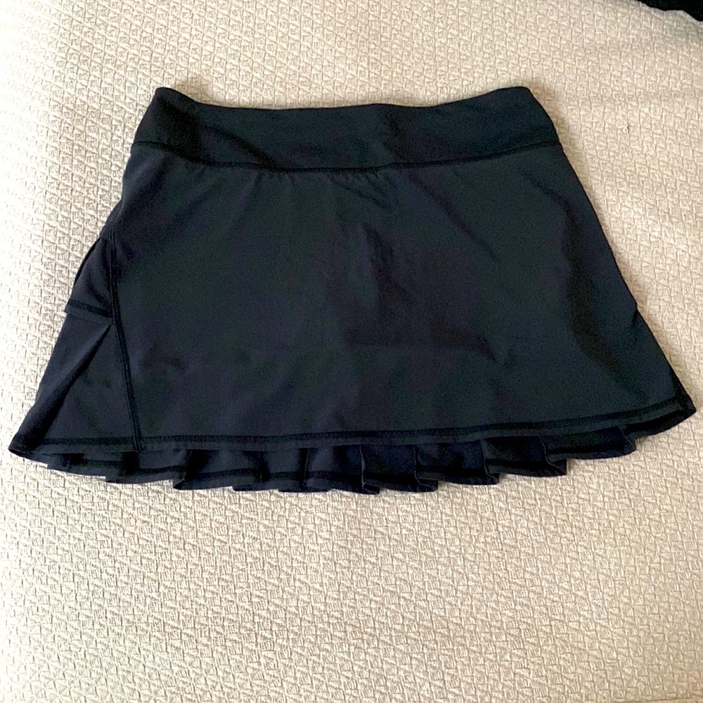 Black Lululemon Tennis Skirt with back pleats, Size 6.  Like new.